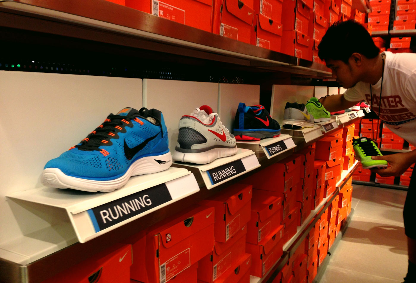 Shoes for running, basketball, tennis, football and other athletic gear are available for big discounts at the Nike Factory Shop in The Outlets at Pueblo Verde. Other athletic shops in the area include those of Adidas and G-Force (which sells Reef and Oakley products). (Photo by Max Limpag)