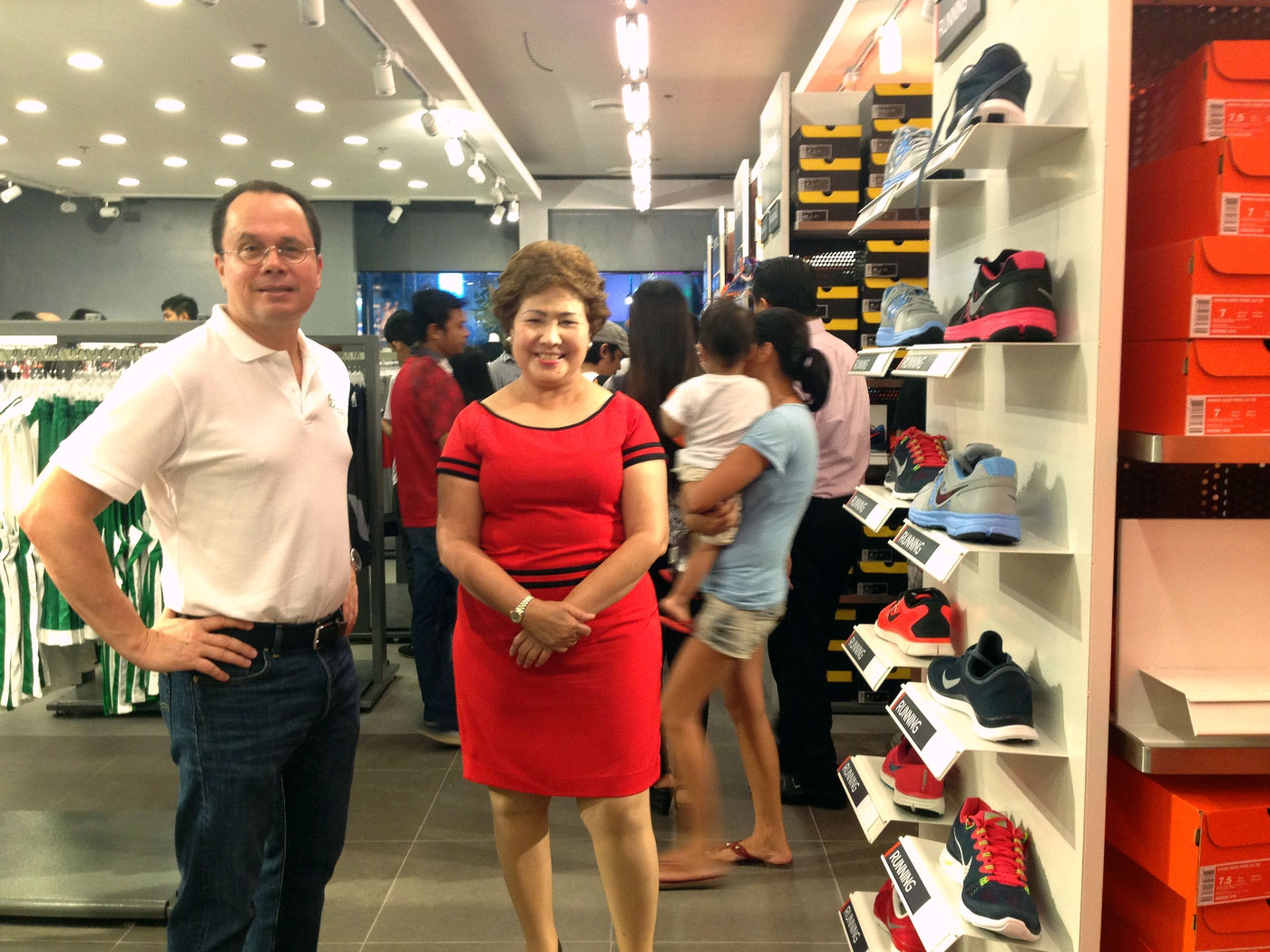 TOURISM DRAW. Lapu-Lapu City Mayor Paz C. Radaza with AboitizLand president and CEO Andoni Aboitiz inside the Nike Factory Store in The Outlets at Pueblo Verde. Radaza said The Outlets will complement the city's tourism push. (Photo by Max Limpag)