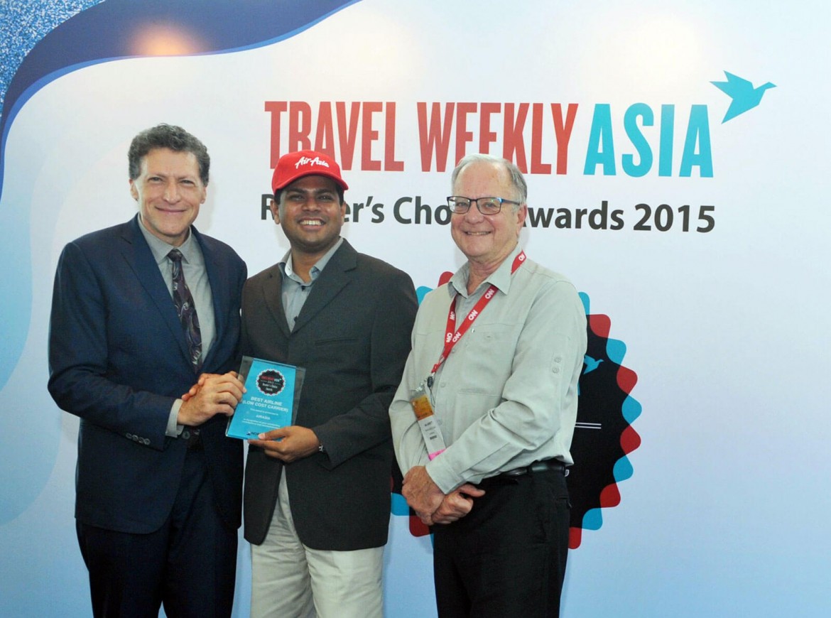 AWARD FOR AIRASIA. Logan Velaitham (center), CEO of AirAsia Singapore, accepts the award from Arnie Weissmann (left), editor-in-chief of Travel Weekly, and senior VP and editorial director of Travel Group, Northstar Travel Media and Mr Ian Jarrett (right), editor-at-large of Travel Weekly Asia.