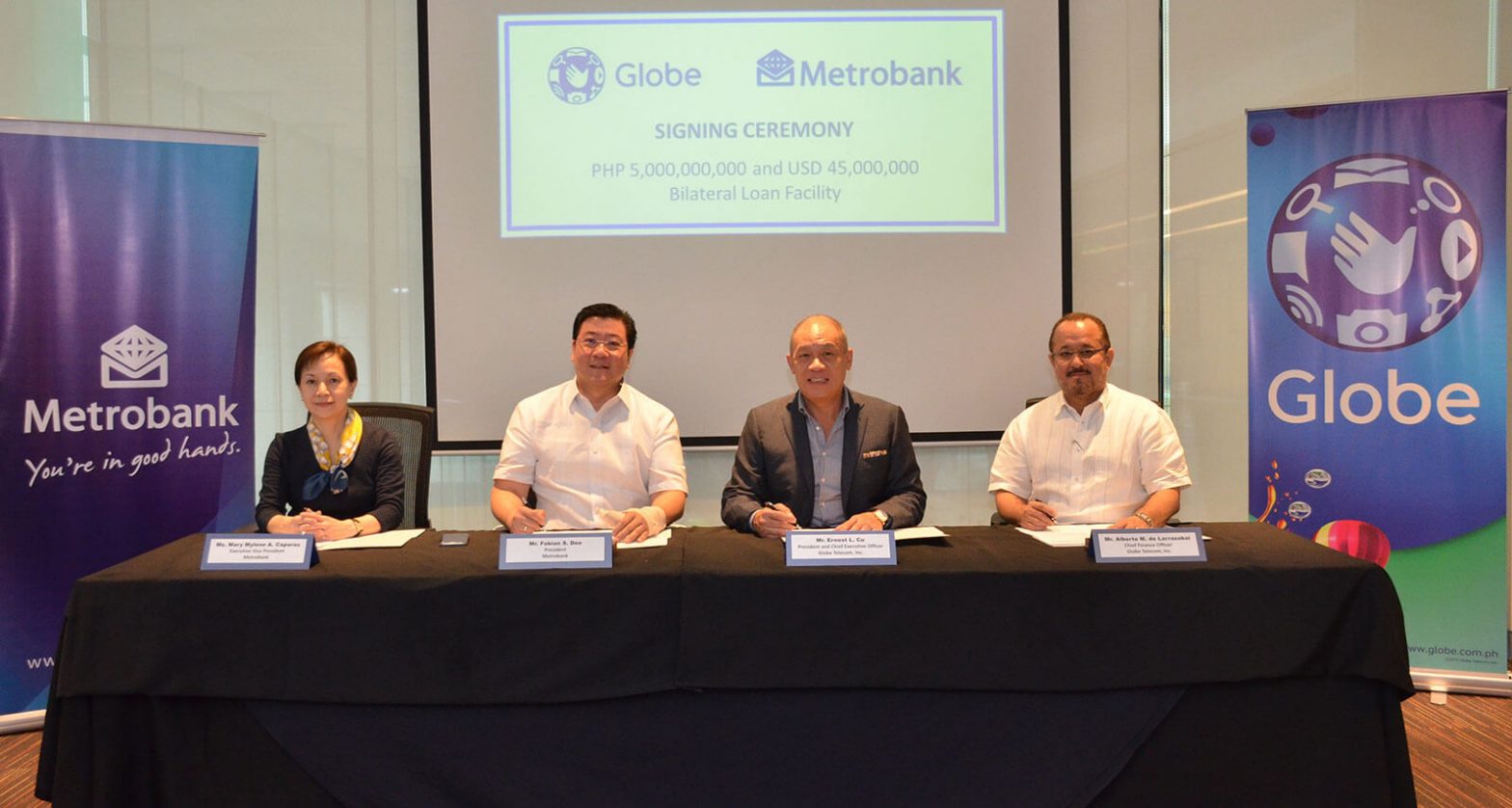 Globe Telecom signs P5B and $45M term loan with Metrobank