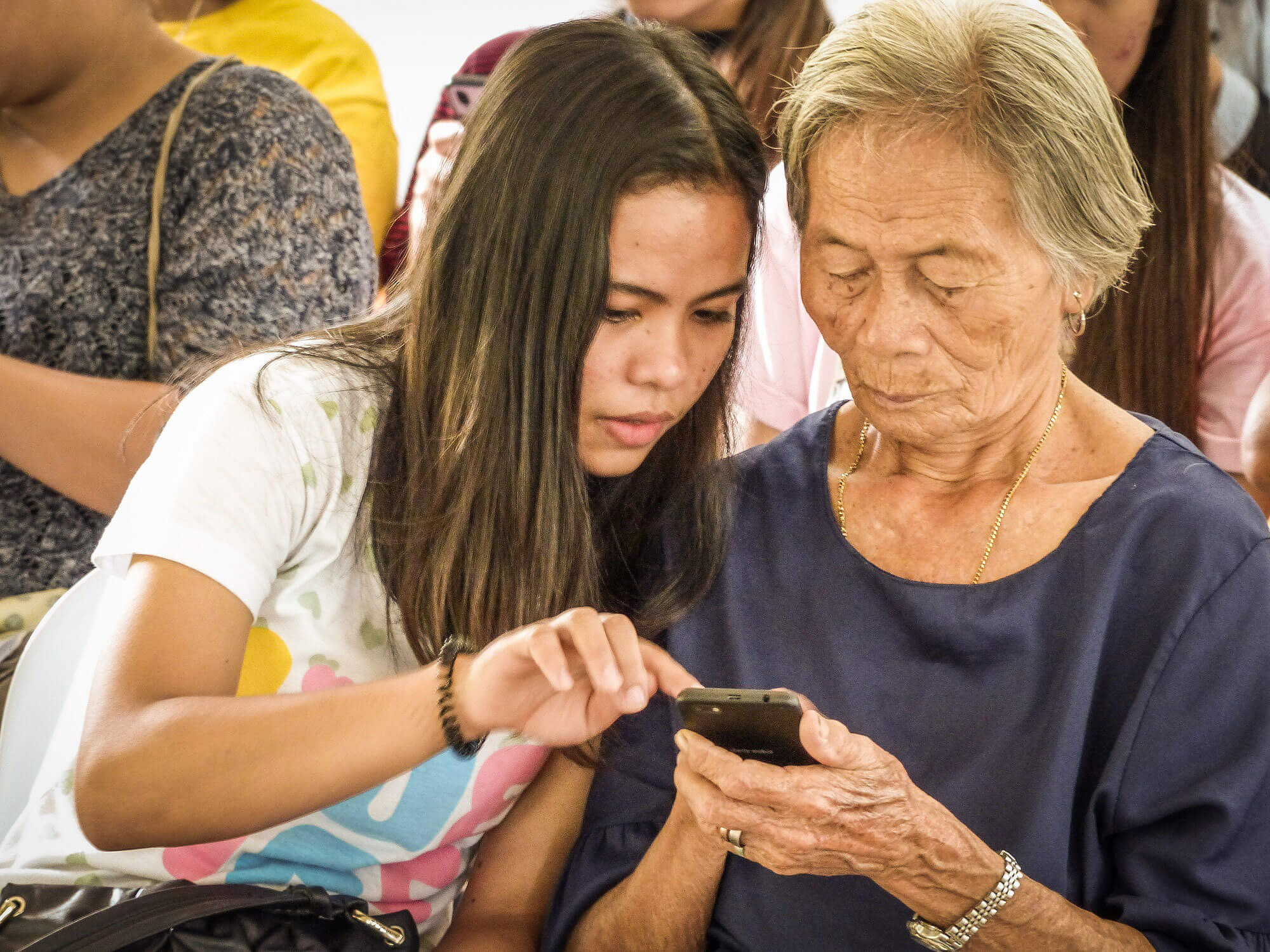 Nanay Miliang, 82, is one of the oldest participants in the Argao session. She and her fellow seniors learned more about smartphones, social media and internet safety during the session.