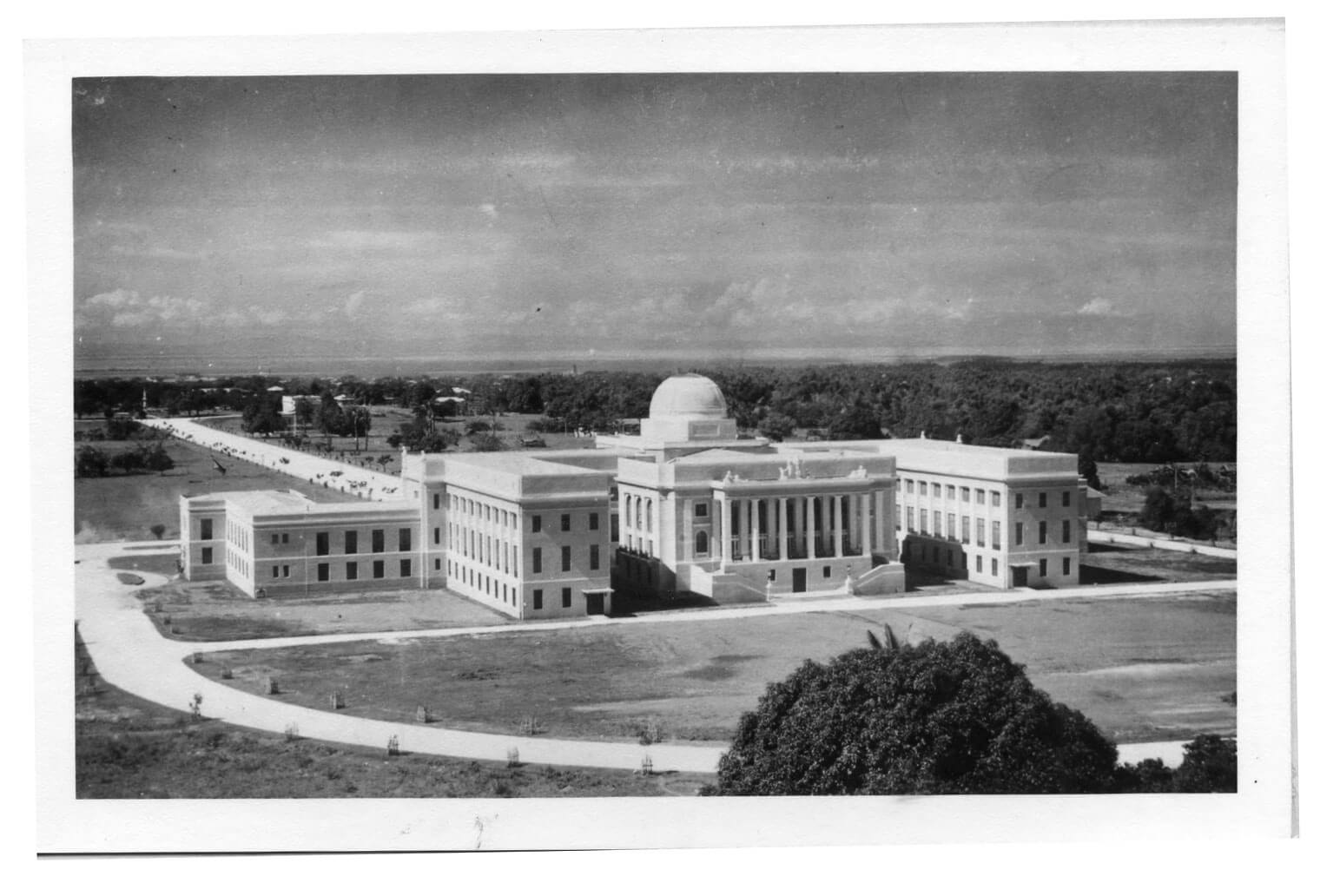 “REMOTE LOCATION.” A photo of the Capitol taken in 1940. When it was being built, people criticized the location of the new Capitol building. Radio commentators made fun of it saying that it was so remote only monkeys from the hills behind it would attend the sessions in the building. (Photo from the Medalle Collection and used with permission of the Cebuano Studies Center of the University of San Carlos.)