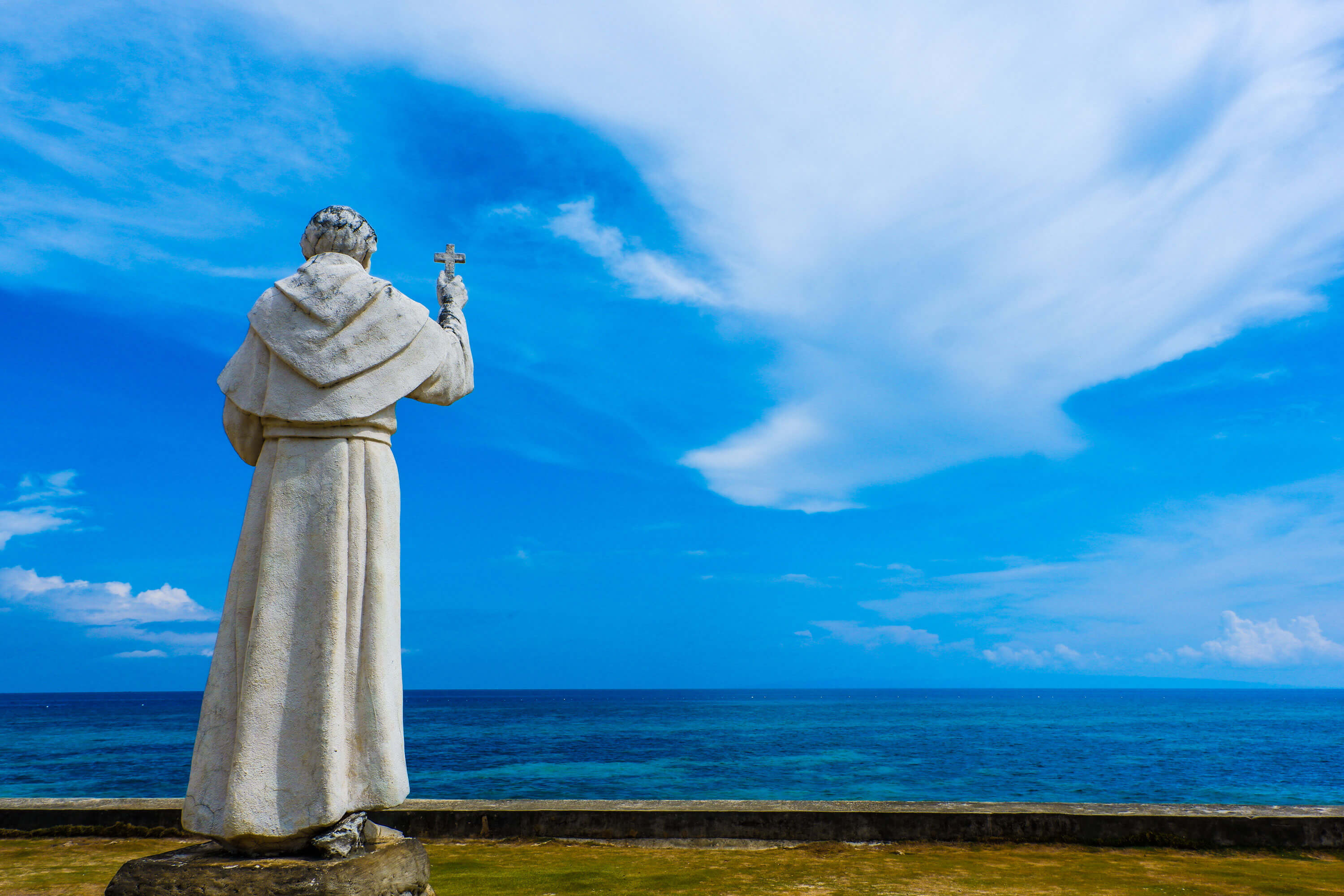 FR. JULIAN BERMEJO looks out to sea. Out there is Sumilon Island where his fleet of Boljoanons defeated Moro raiders led by Gorandeng in 1813. They decapitated the leader and hang his head on the mast. After that decisive victory, raids on Boljoon stopped.