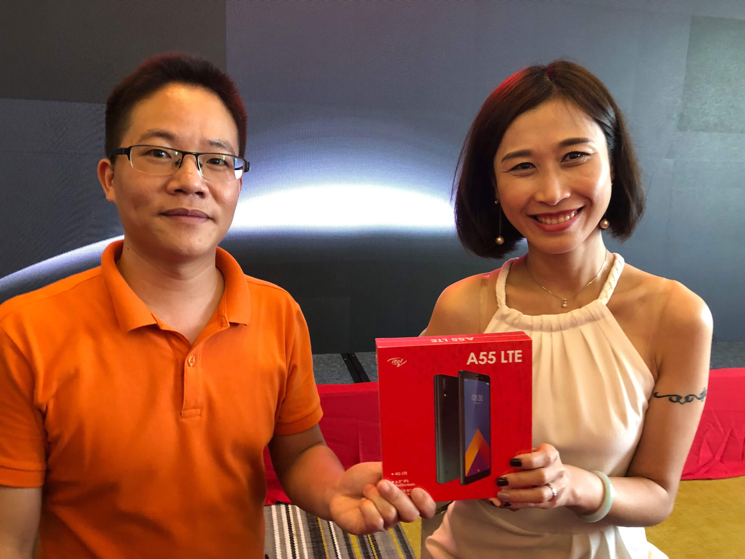 CURRENT FLAGSHIP. Itel Sales Manager Star Luo (left) and Head of Southeast Asia Rachel Wei hold the itel A55, the company’s current flagship device. It has a 6-inch IPS screen, octacore 1.6Ghz processor with 2GB of RAM, 16GB of storage that is upgradeable, and Android 9. The unit sells for P3,600.