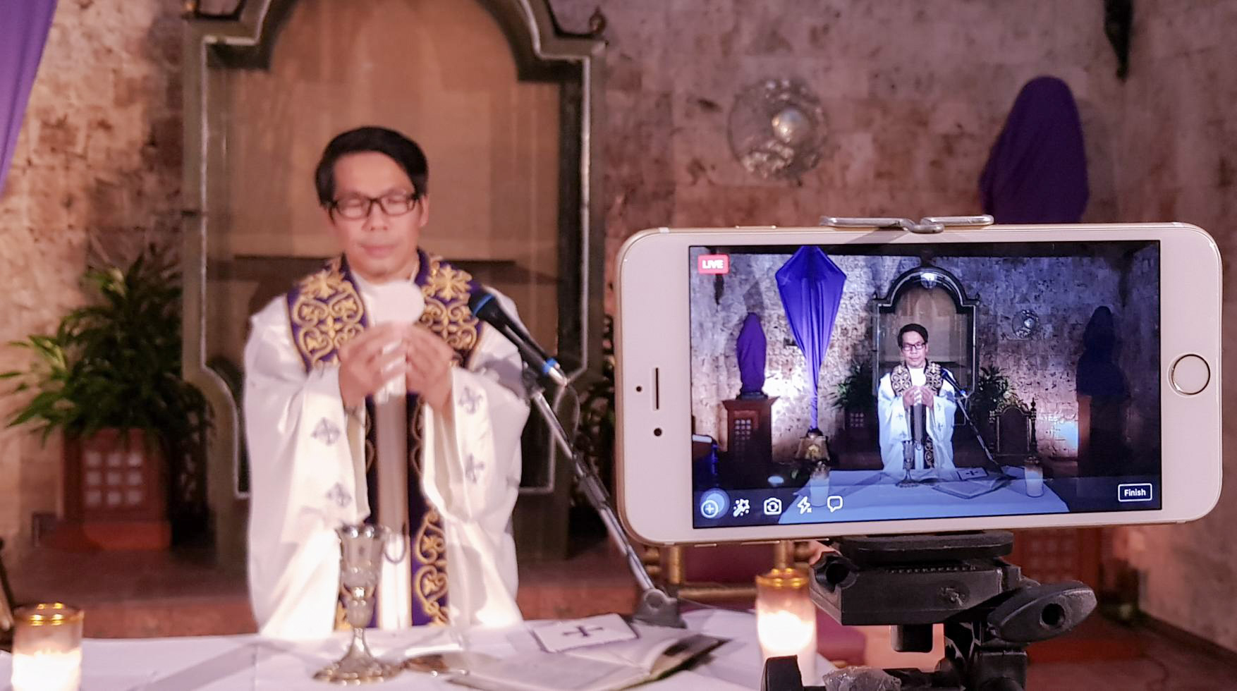 FACEBOOK LIVE. Fr. Joselito Danao of the Archdiocesan Shrine of the Immaculate Heart of Mary in Minglanilla, Cebu holds a mass and streams it via Facebook Live. Fr. Danao said livesteaming introduces a new avenue in encountering God using digital tools.