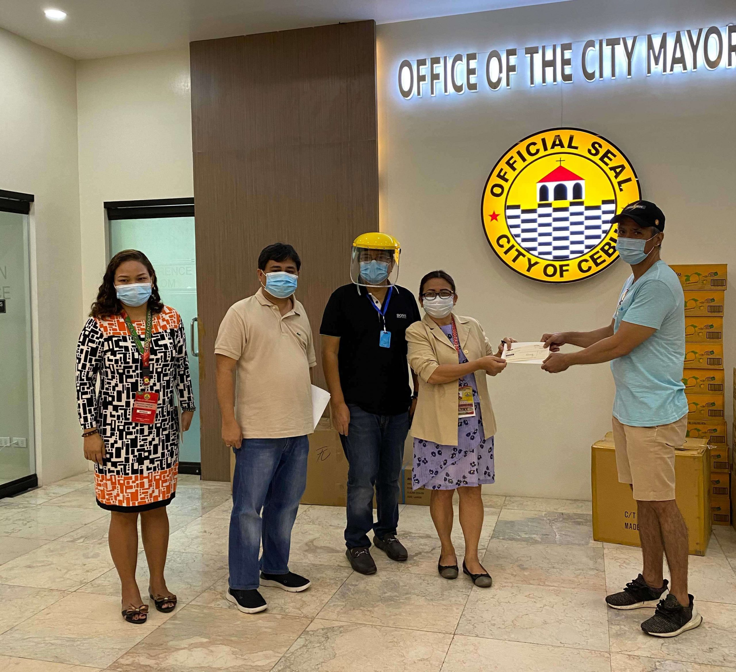 CEBU CITY officials led by Mayor Edgardo Labella (3rd from left) accept businessman Michael Gleissner’s P2 million donation from his representative in Cebu, Joe Mercado. The amount will be used in the city’s Covid-19 response, particularly in helping ease the burden on residents affected by strict quarantine measures. Also in the photo are (from left) Atty. Mary Rose S. Lubino, Labella’s chief of staff; Atty. Jerome Castillo of the City Treasurer’s Office and City Treasurer Juanita Monina Paires.