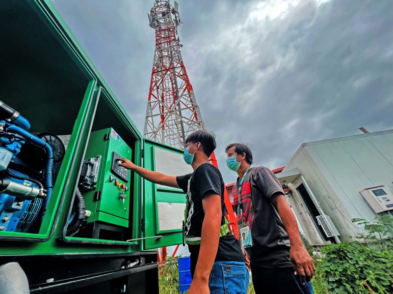 North Luzon Smart engineers deployed to Cebu switch on a generator set to power the cell site serving Cordova, Cebu.