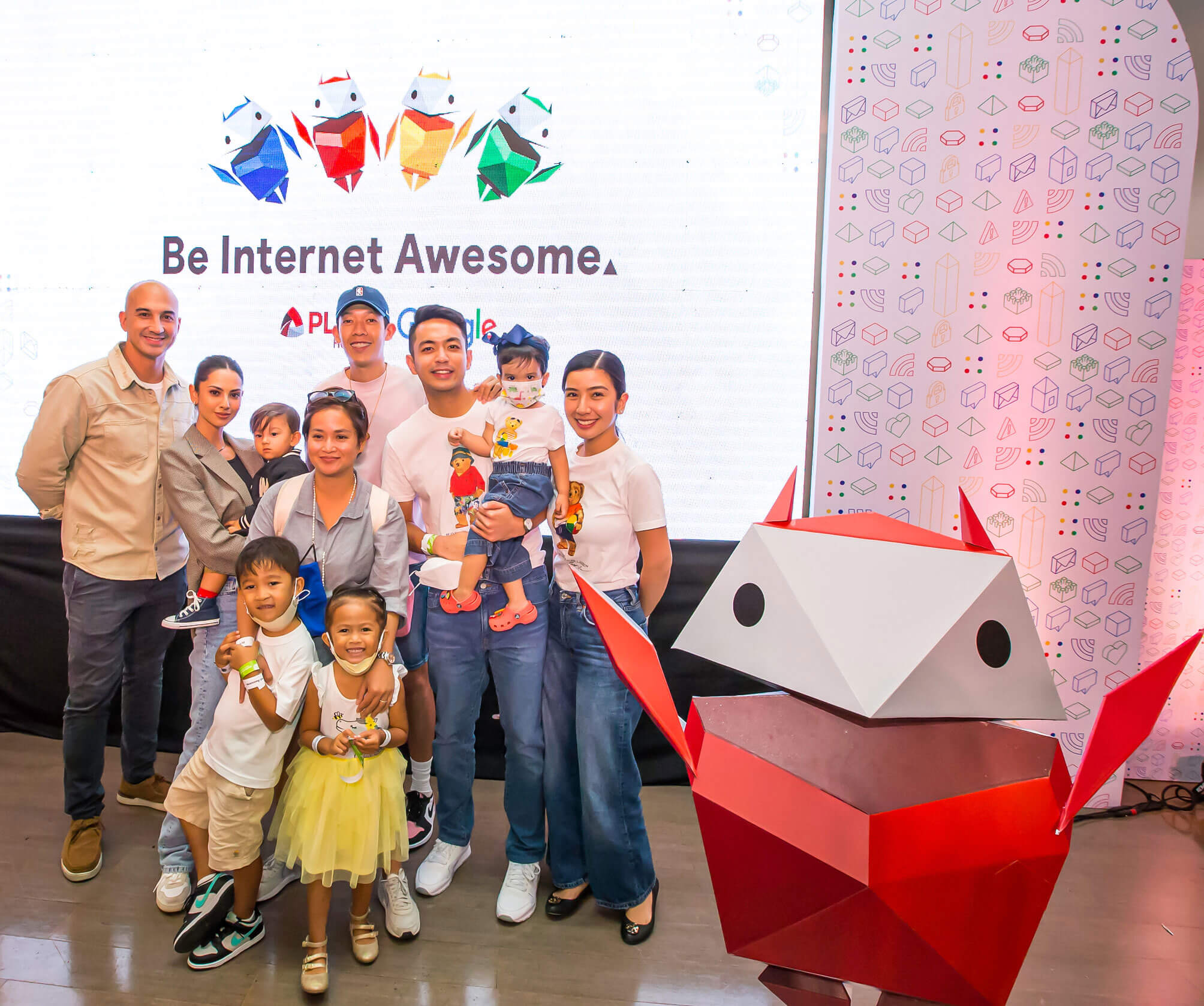 Actor and host KC Montero (left) and family with newscaster, Migs Bustos (3rd from right) and family; and UAAP sportscaster and DJ Riki Flo (3rd from left, front row) and family.