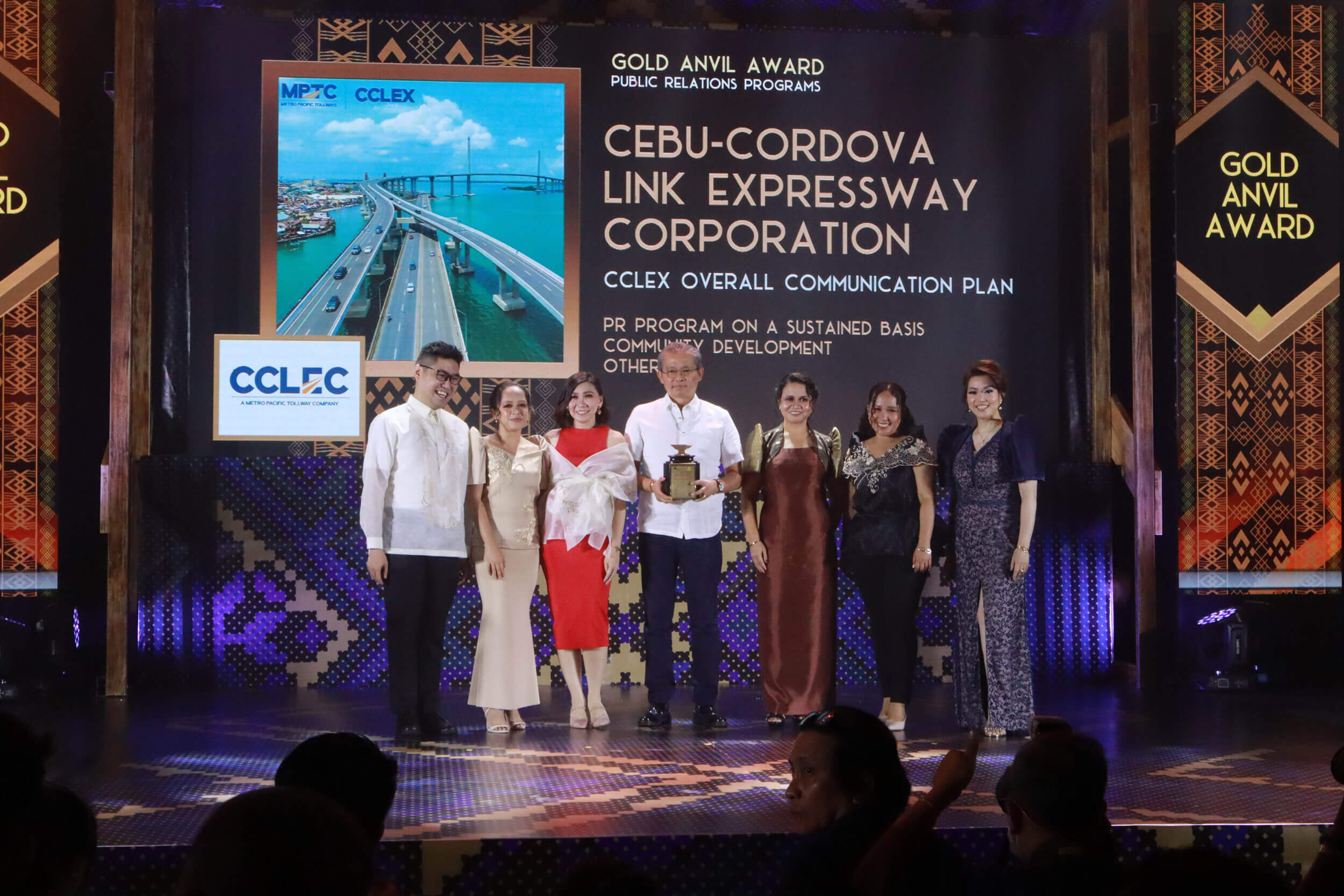 GOLD ANVIL. The CCLEC team receives a Gold Anvil for its communication campaign to introduce the 8.9-kilometer Cebu-Cordova Link Expressway to Cebuano motorists. Accepting the awards for CCLEC are President and General Manager Allan G. Alfon (center) and the CCLEC Communications and Stakeholders Management (CSM) team – Jasmin G. Suma-oy, Princess Dawn H. Felicitas, Imare Sheen B. Gutang, Kendall A. Roa, and Carryl D. Alpuerto.
