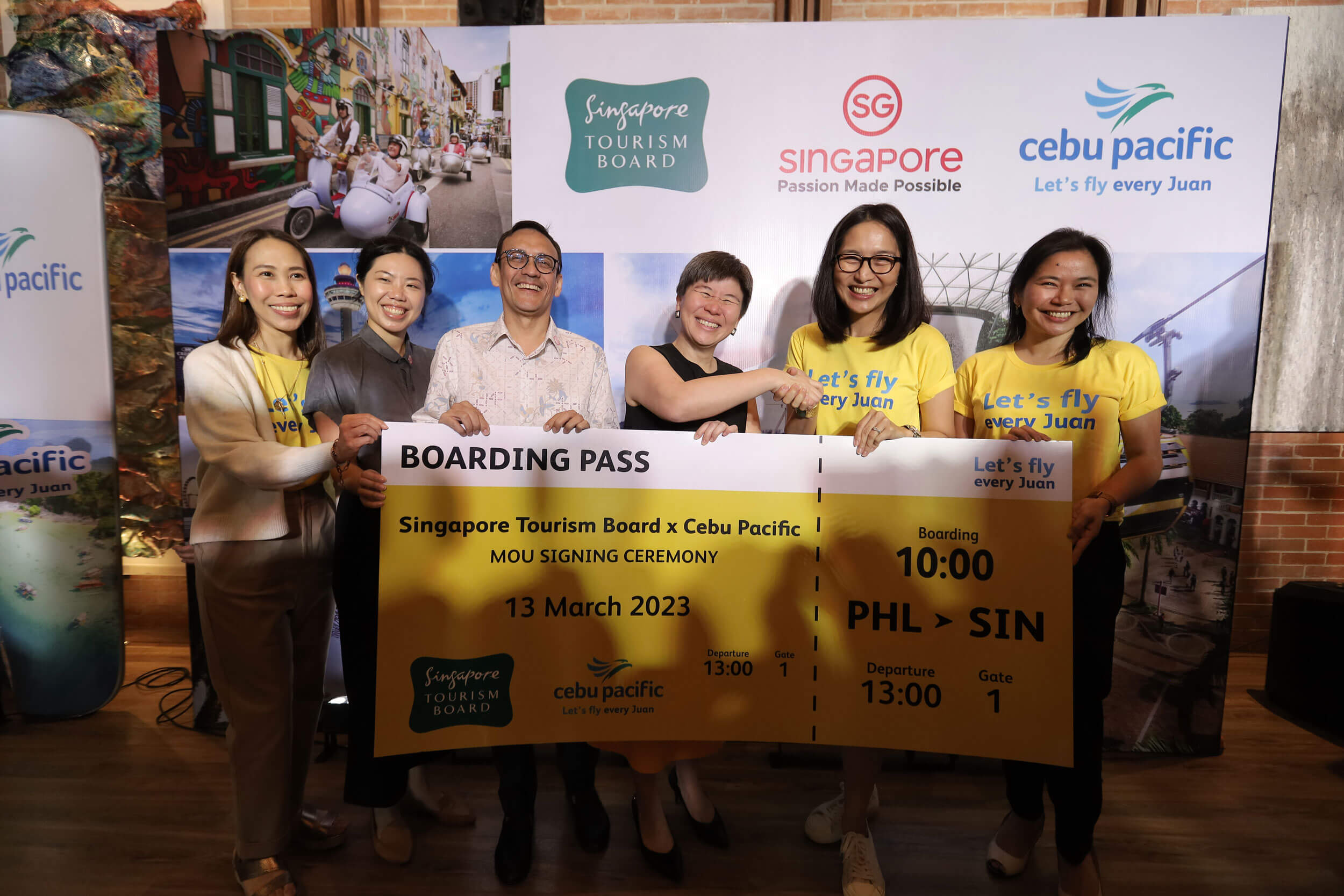 Cebu Pacific and Singapore Tourism Board executives pose for a photo following the MOU signing.