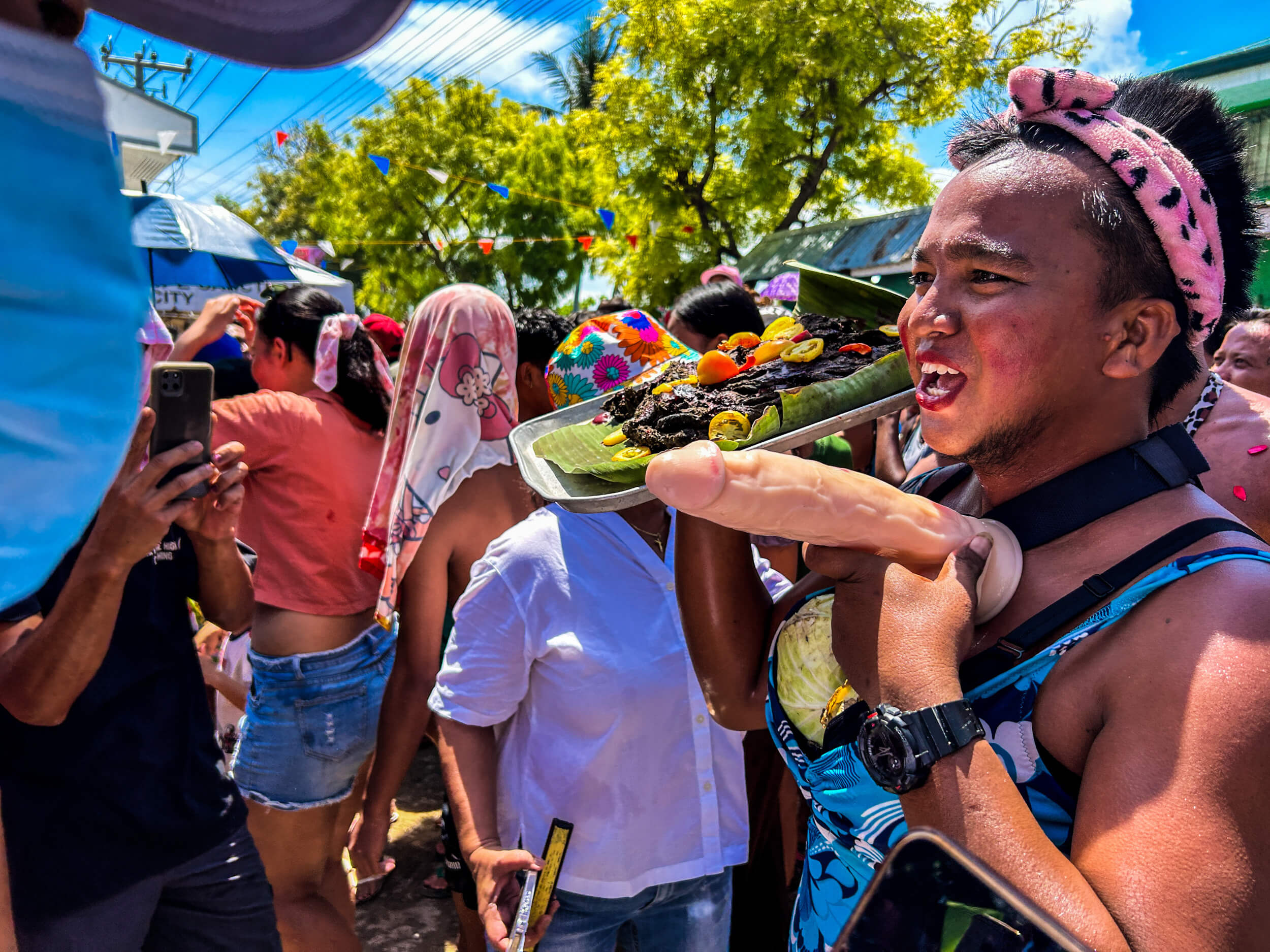 NO LONGER ALLOWED,. Revelers will no longer be allowed to carry around dildos and trays of cow manure sold as "food" on Sunday's Baliw-Baliw Festival.