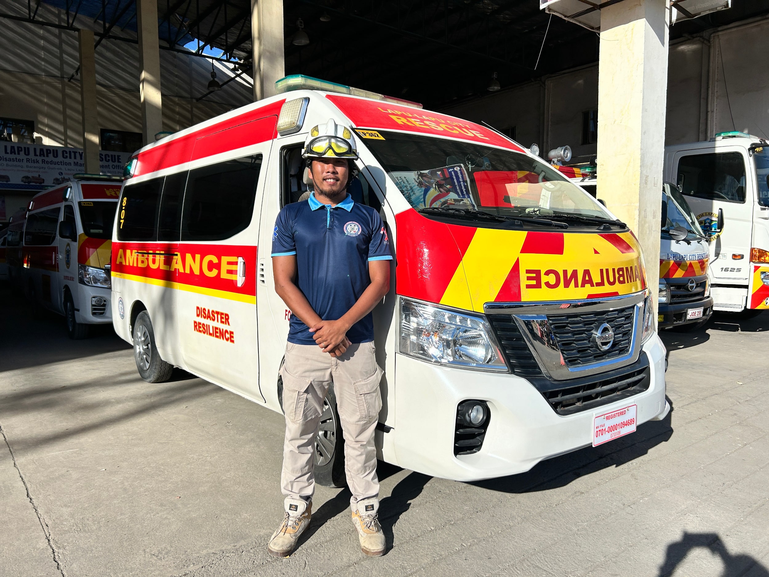 DEVOTION. Emergency responder Mark Anthony Jumao-as poses at the Lapu-Lapu City Disaster Risk Reduction Management Office after rushing a patient to the district hospital. Jumao-as is a Baliw-Baliw festival devotee and credits San Vicente Ferrer for his "second life." 

